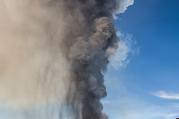 Volcano eruption. Mount Etna erupting from the crater Voragine
