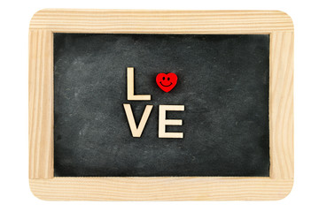 Fototapeta na wymiar Wooden frame vintage chalkboard isolated on white with word LOVE created of wood letters