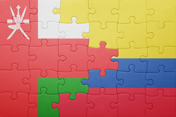 Fototapeta premium puzzle with the national flag of colombia and oman