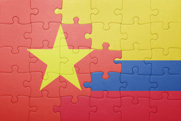 puzzle with the national flag of colombia and vietnam