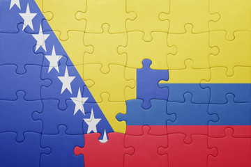 puzzle with the national flag of colombia and bosnia and herzegovina