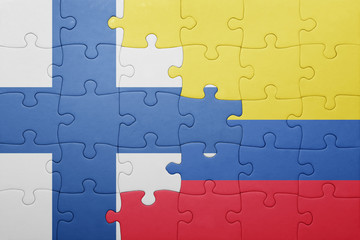 Fototapeta premium puzzle with the national flag of colombia and finland