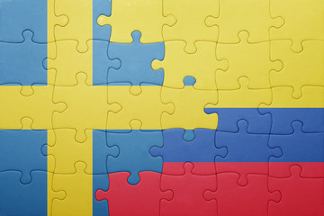 Fototapeta premium puzzle with the national flag of colombia and sweden
