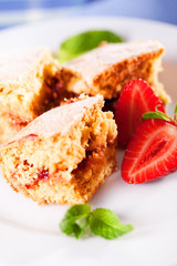 Homemade cake served with strawberries