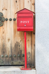post box with wood door