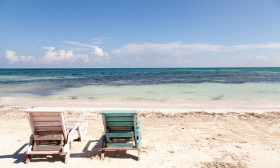 Pastel beach chairs, sun, sea and sand, Caribbean vacation, Jamaica