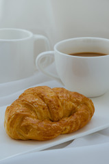 Croissant and Coffee for Breakfast.