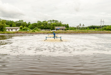 surface aerators in waste water pond at landfill site use for ma