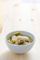 Chinese vegetable stew, mixture of vegetables and pork on wooden
