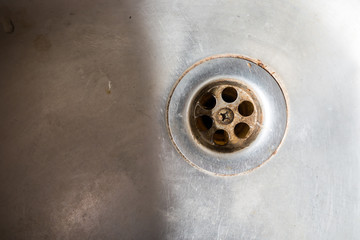 stainless steel sink plug hole close up