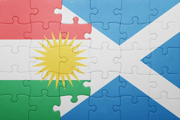 puzzle with the national flag of kurdistan and scotland