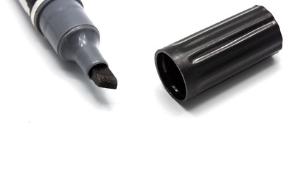 Close up shot of Black Permanent Marker a white background