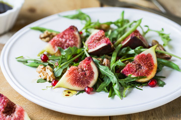 Fig with Pomegranate and rocket salad
