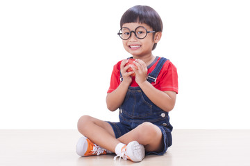 Little boy with red apple