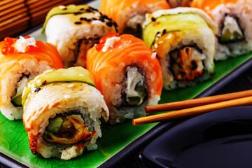 Sushi set: sushi roll with salmon and sushi roll with smoked eel