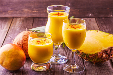 Tropical milkshake with ingredients.