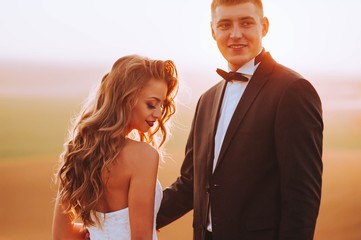 Beautiful wedding day, love on the sunset