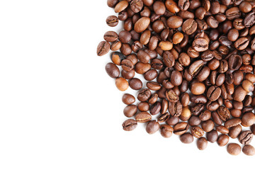 Roasted coffee beans on a white background