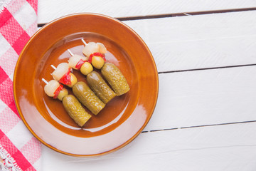 spanish banderillas, skewers with different pickles, such as oli