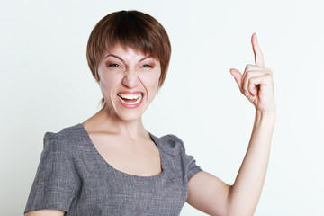 mad smiling woman pointing