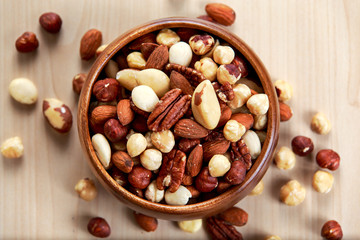 mix nuts in wooden bowls