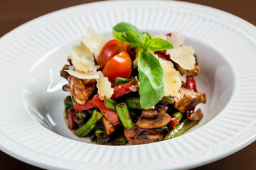 Chicken salad with vegetables and parmesane