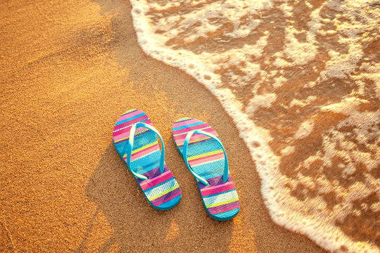 slippers on the beach