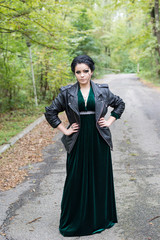 Unusual beautiful bride in a green dress