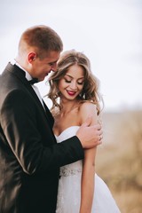 beautiful wedding couple in the mountains