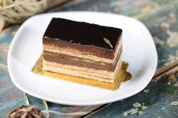 Opera cake on a white plate