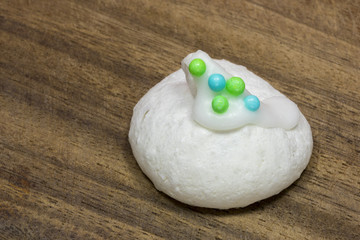 Christmas meringue with colorful sugar pearls