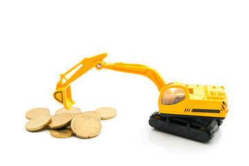Fototapeta premium yellow backhoe and coins