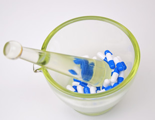 Mortar pharmacy and capsules