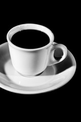 cup of coffee on black background