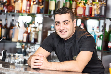 Portrait of barman worker  in bar