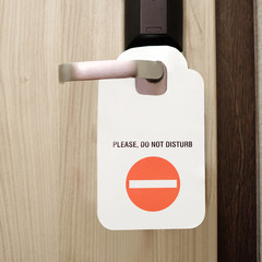 Do not disturb sign hang on door knob