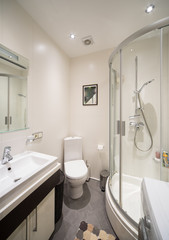 Modern Interior of a bath room in the private house.
