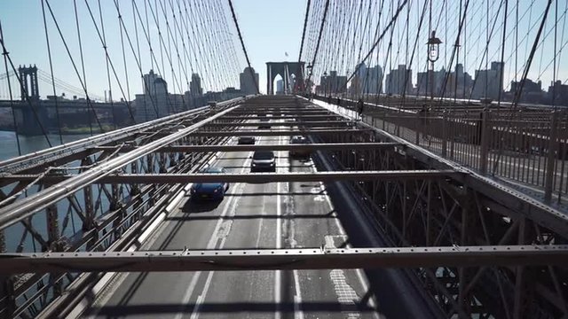 Oncoming traffic, pedestrian traffic and a second bridge