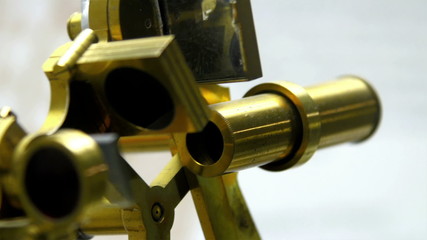 Closer look of the telescope in the ship. A telescope is an instrument that aids in the observation of remote objects by collecting electromagnetic radiation 