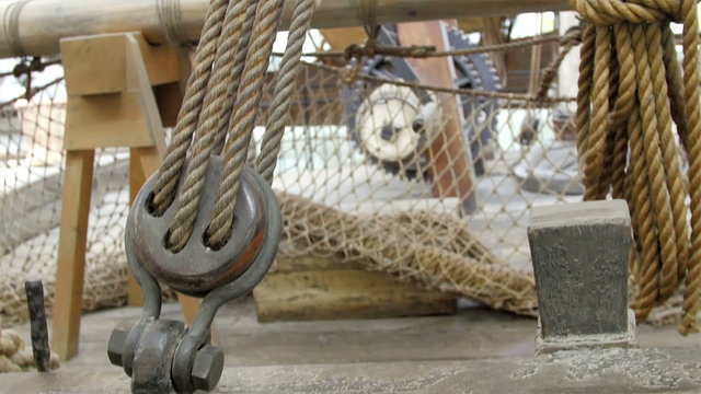 Big ropes on the levers in the ship. The ropes helps in pulling up the sail in the ship
