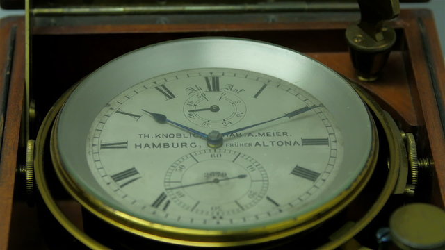 A marine chronometer watch found inside the ship. A marine chronometer is a timepiece that is precise and accurate enough to be used as a portable time standard