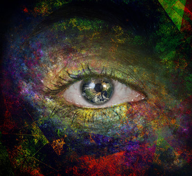 Girls eye with paint and earth