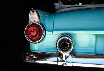 Deurstickers Chrome rear tail lights, bumper bar and exhaust of convertible aqua © Mantis Design