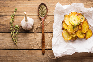 Homemade potato chips with spices