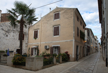 Old town street with stores in Porec  in Croatia