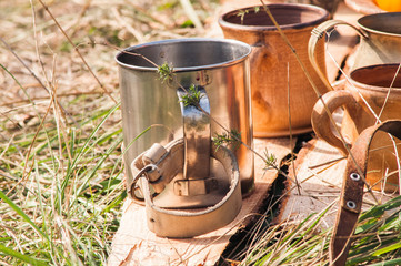 clay and metal mug