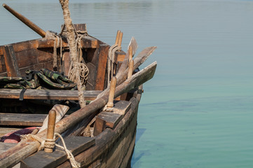 sailing boat with oars on the river