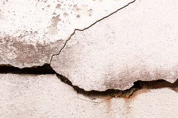 Cracked concrete wall textured or background.