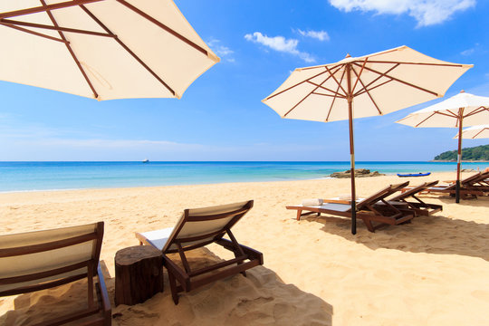 Beds And Umbrella On A Beach