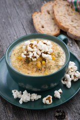 corn soup with popcorn, vertical